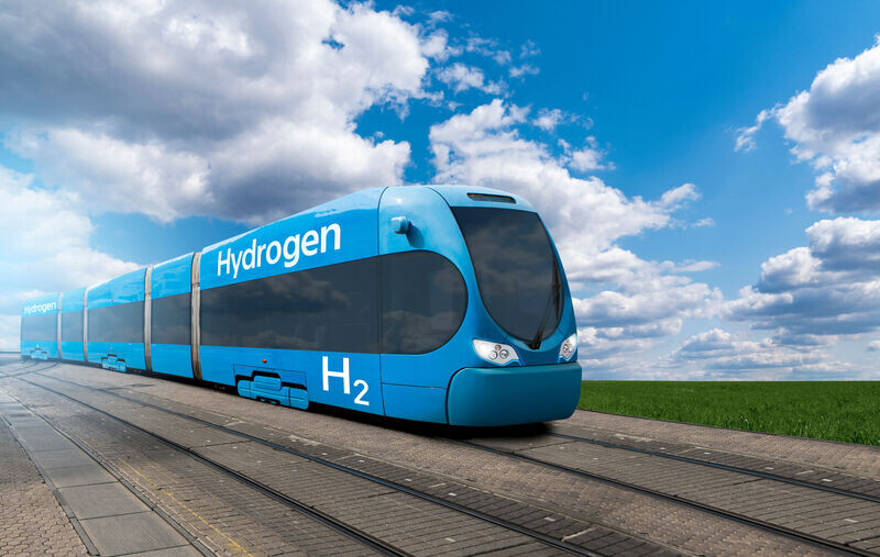 Hydrogen train with nature and bluesky in the back