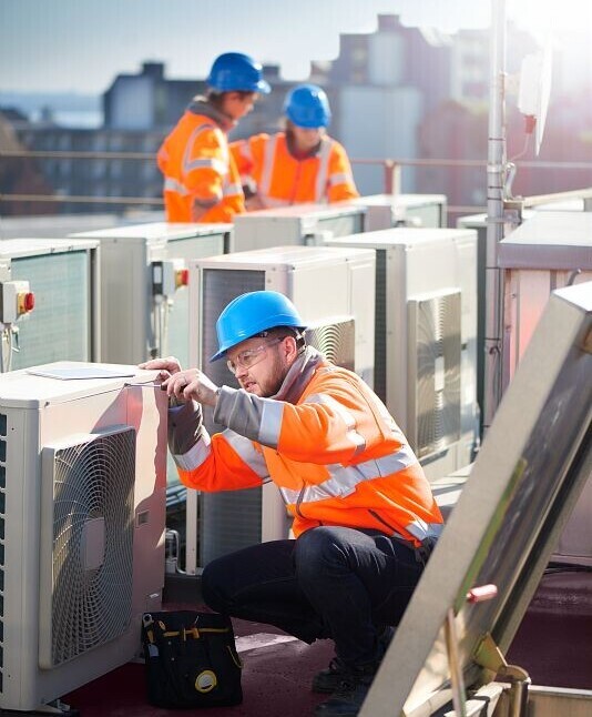 Engineer checking an industrial air conditioning system